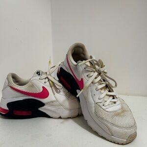 Nike White Shoes with Pink Swoosh and Black Accents